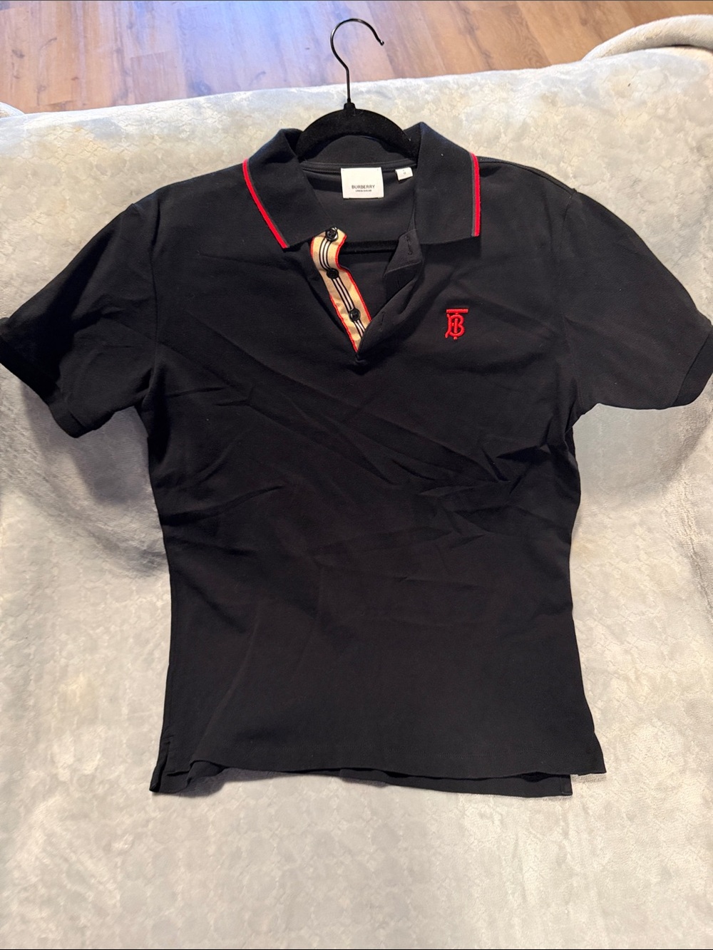 Burberry Black Polo with Red Accents and Beige Check Placket